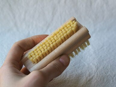 Wooden nail brush with Tampico bristles