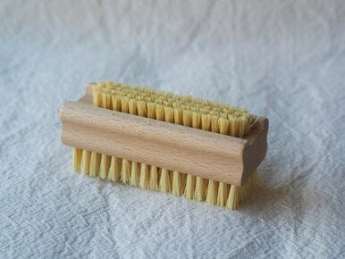 Wooden nail brush with Tampico bristles