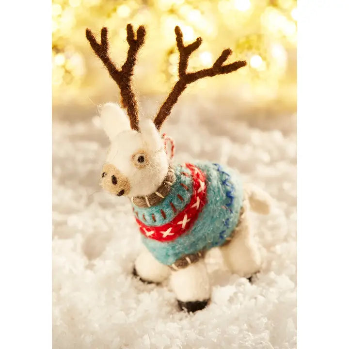 felt reindeer in embriodered blanket